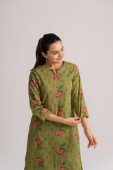 Women wearing olive green floral print A-line kurta with solid olive palazzo – Ekisha