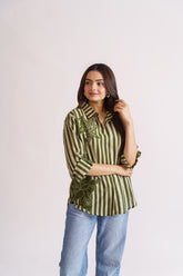 Olive stripe floral shirt styled with blue denim jeans