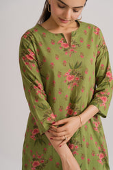 Generous A-line flared kurta with all-over pink ditsy floral print on olive green cotton – Ekisha