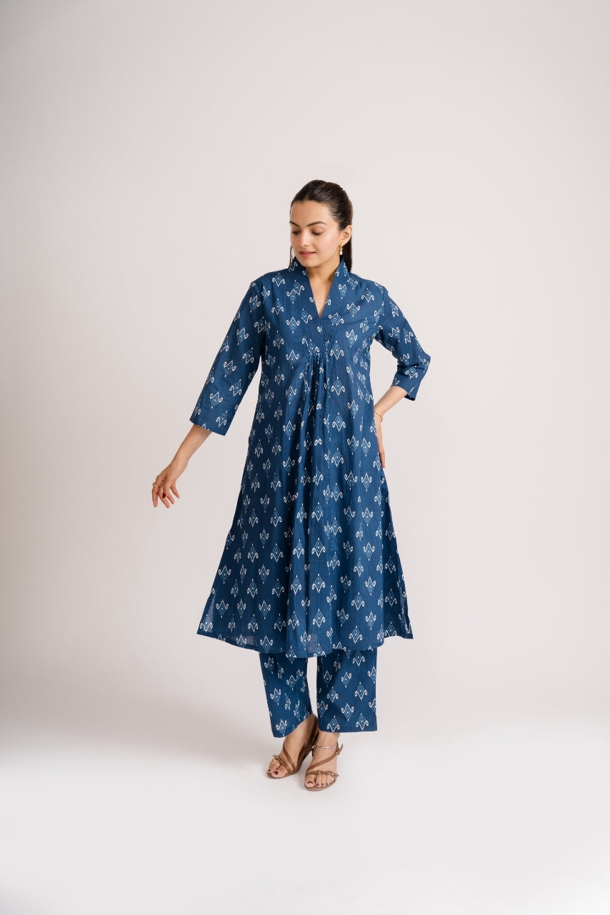 A-line flared kurti with gathered pleat bust detail in indigo ikat print – Ekisha