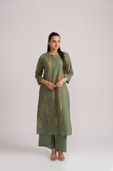 Women wearing sage green straight kurta with mughal botanical block print and solid palazzo – Ekisha