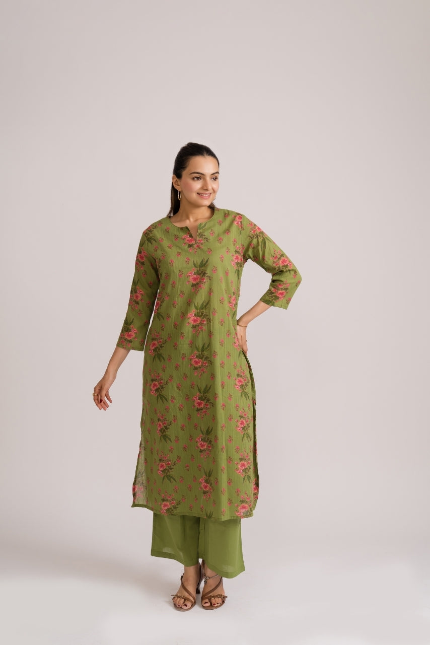 Close-up of dusty pink and green ditsy floral print on olive cotton fabric – Ekisha