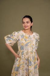 Ekisha's women cream multicolor floral printed pure cotton midi dress, front view 5