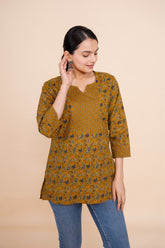 Women mustard floral designer printed cotton tunic top short kurti, front view 2
