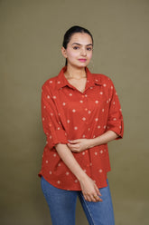 Women Pure Cotton Orange abstract printed relaxed fit shirt, front view 2