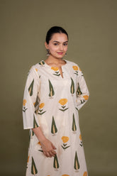 Women cream designer printed floral pure cotton Co-Ord Set, side front view