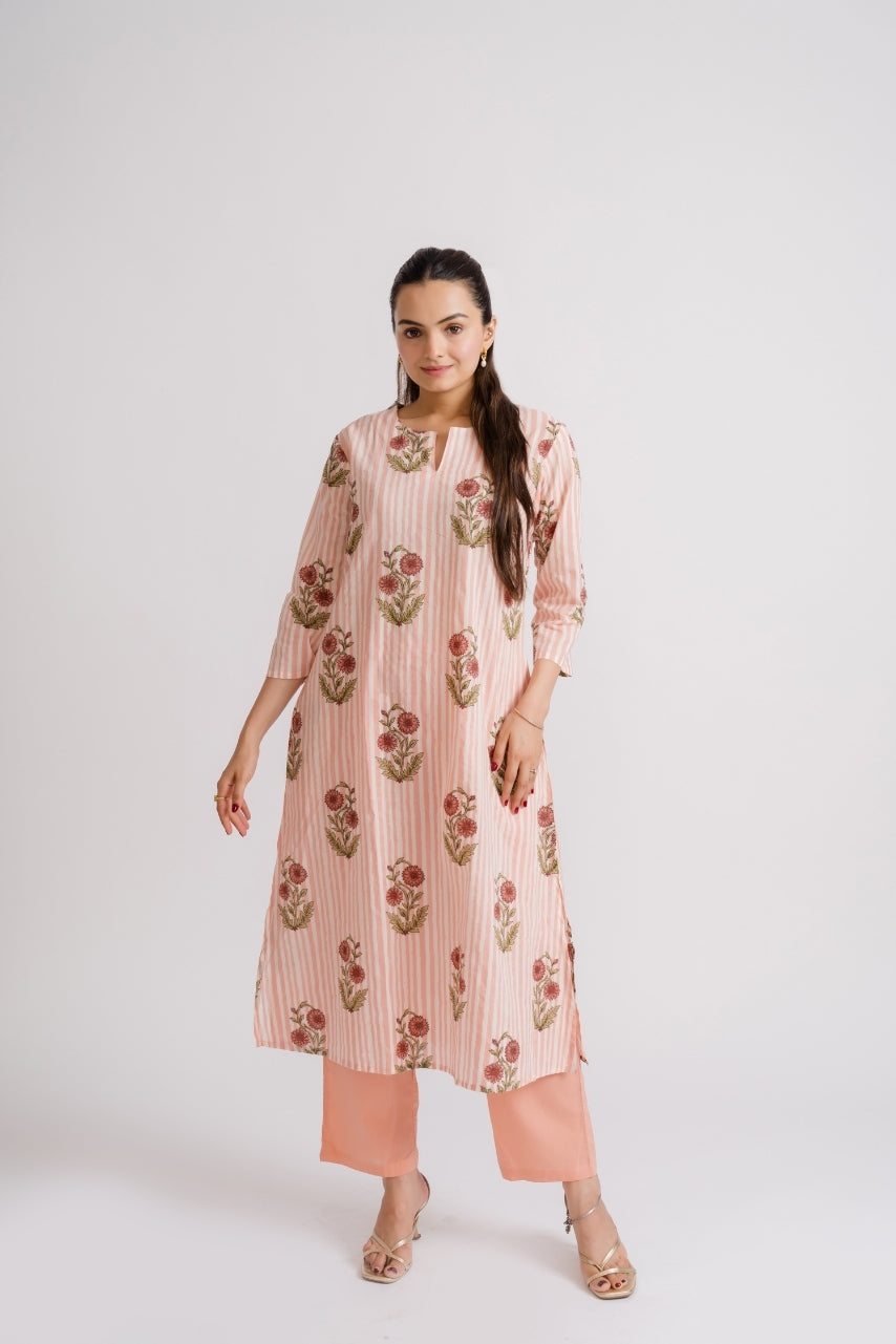 Women wearing peach striped A-line kurti with marigold buta print and solid palazzo – Ekisha