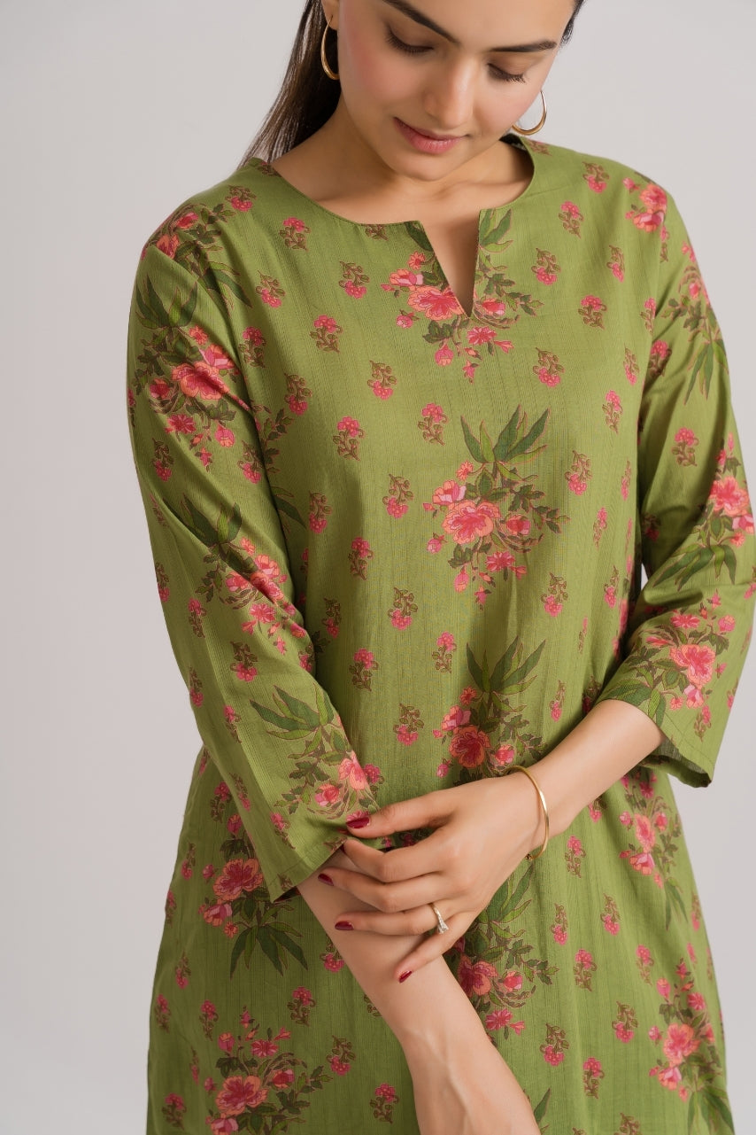 Generous A-line flared kurta with all-over pink ditsy floral print on olive green cotton – Ekisha