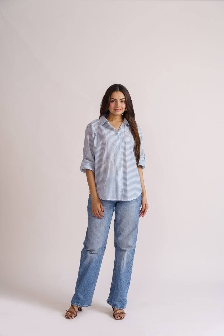 Blue striped shirt button placket close-up view