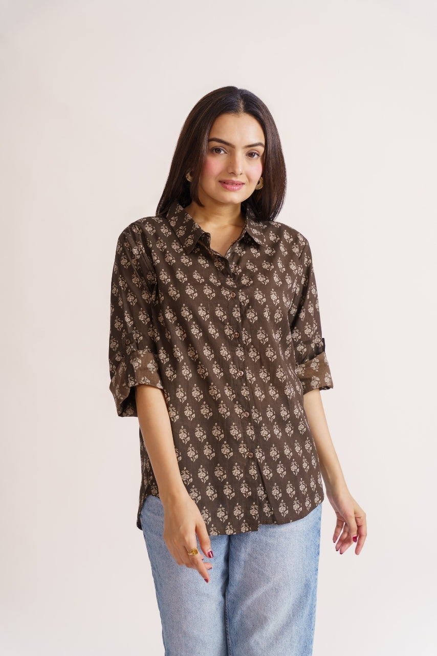 Brown floral shirt styled with blue denim jeans, casual outfit