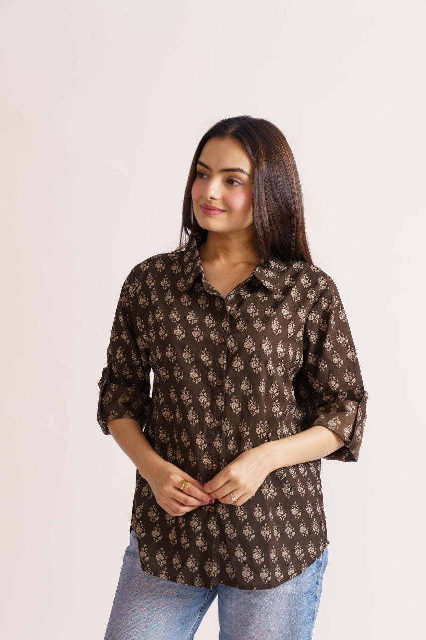 Brown floral shirt styled with blue denim jeans, casual outfit