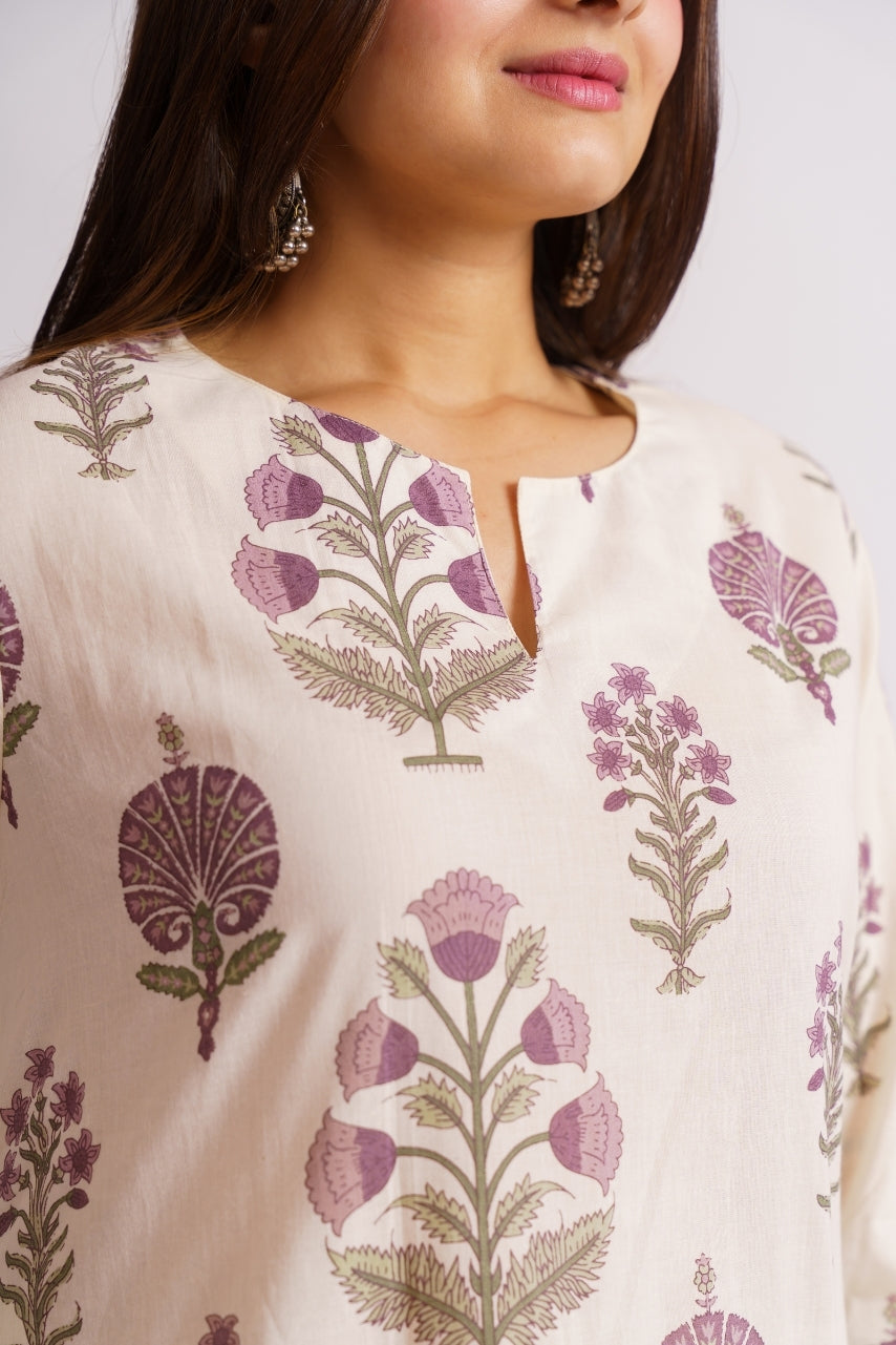 Close-up of block print motif on cream cotton kurti fabric