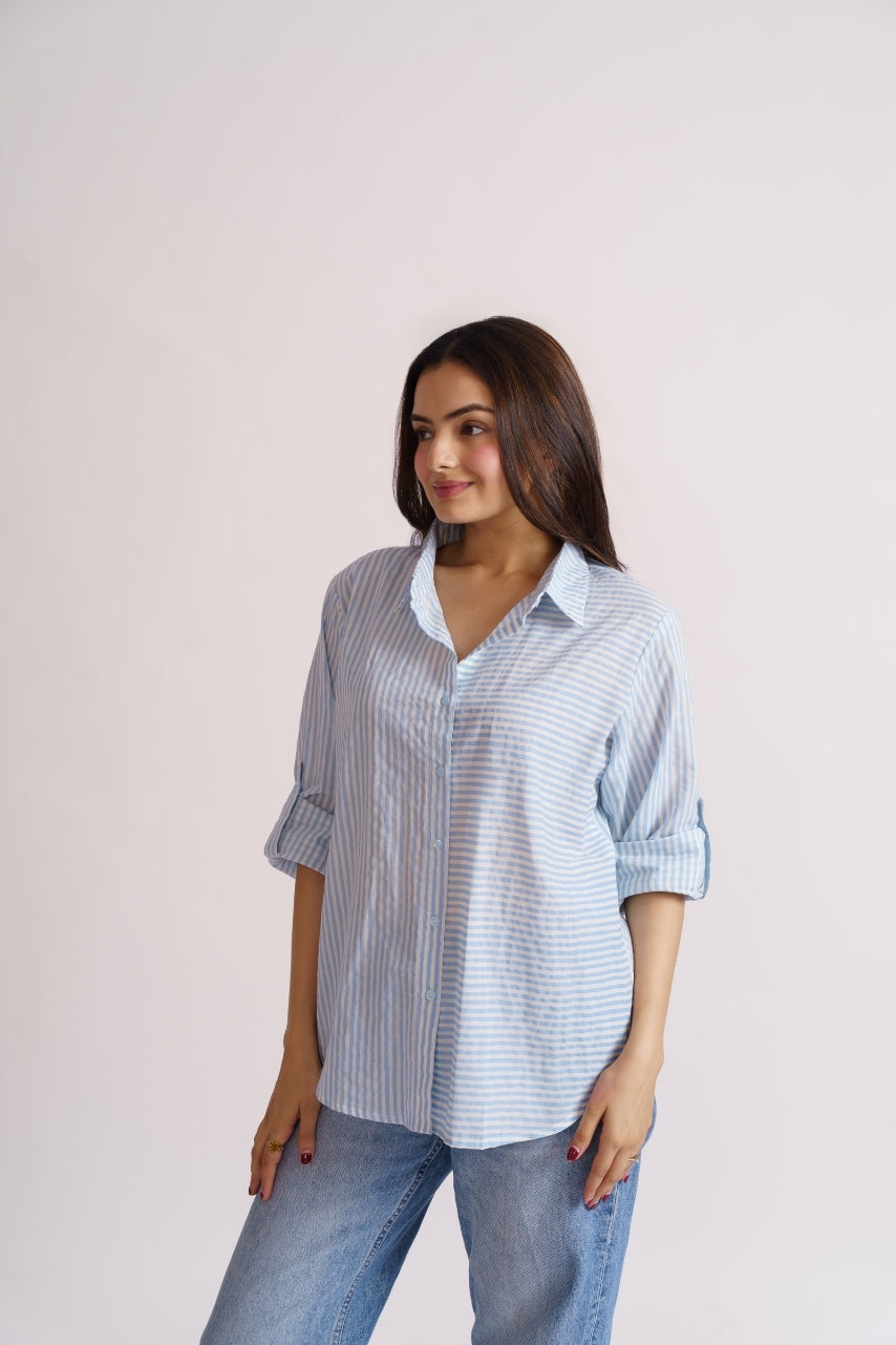 Blue striped button-down shirt collar and shoulder detail