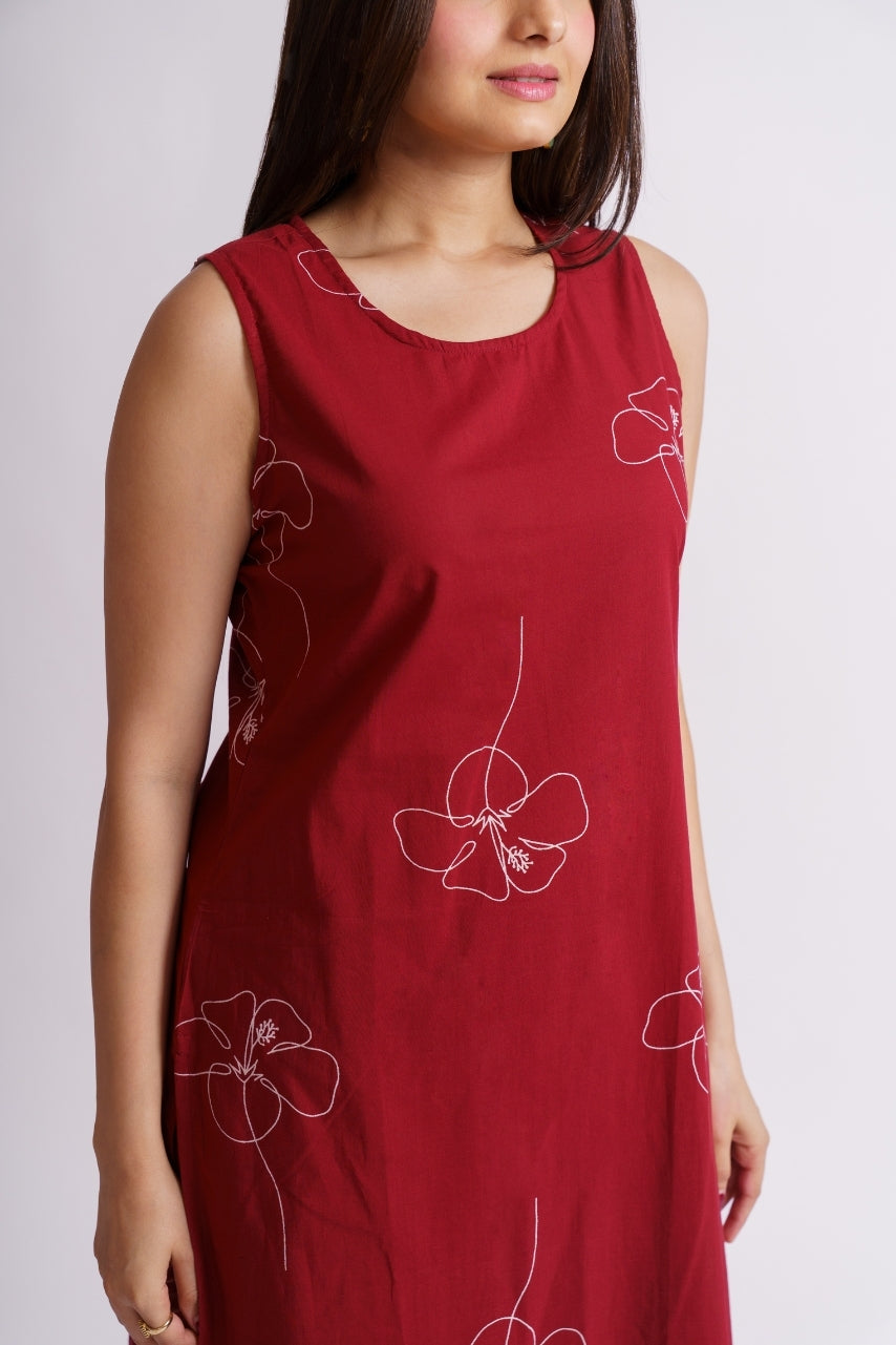 Close-up of maroon line floral print cotton kurti neckline