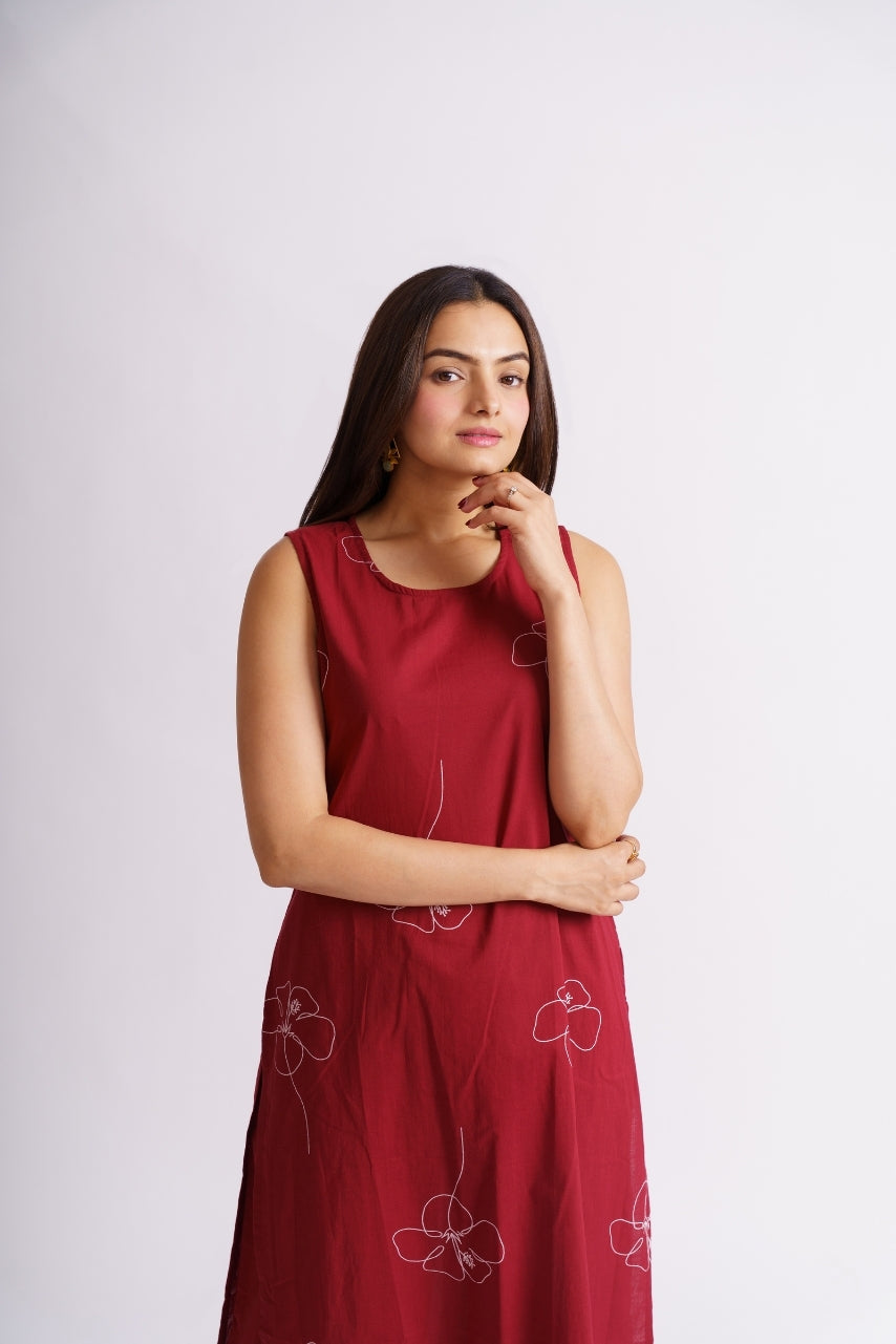 Women's maroon kurti fabric texture and print close-up