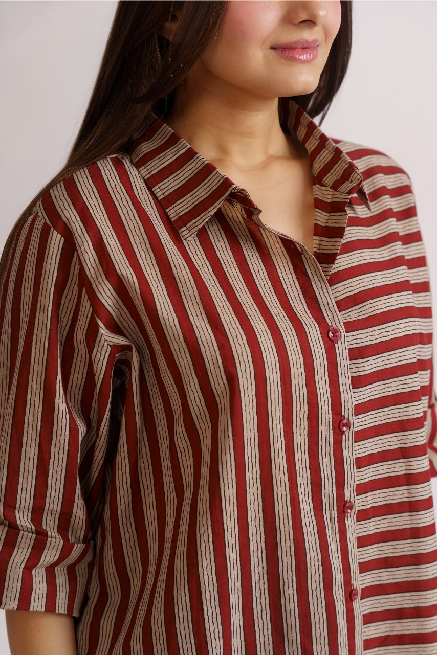 Close-up of mixed-width maroon and beige stripe panel design