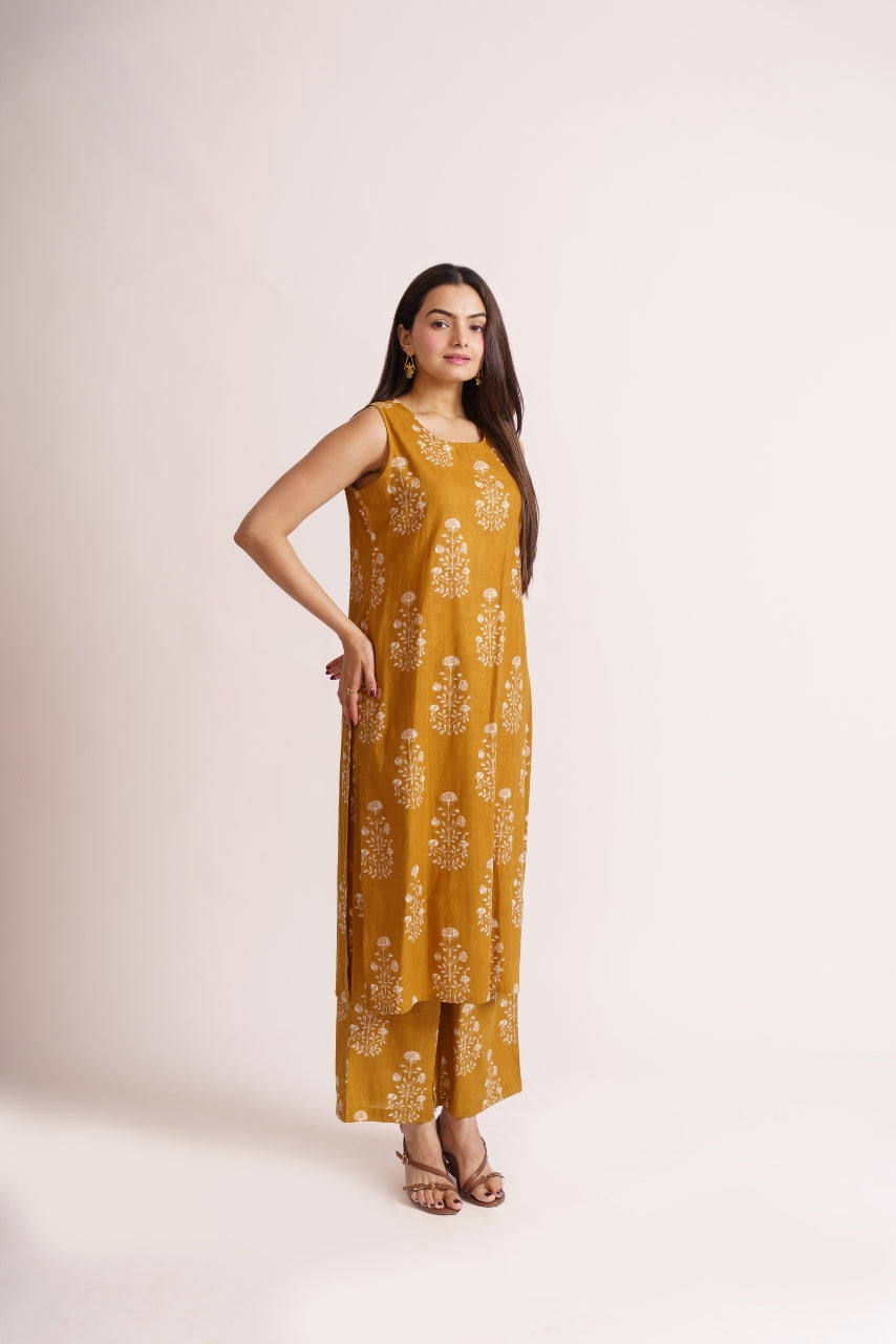Mustard floral set styled with gold drop earrings