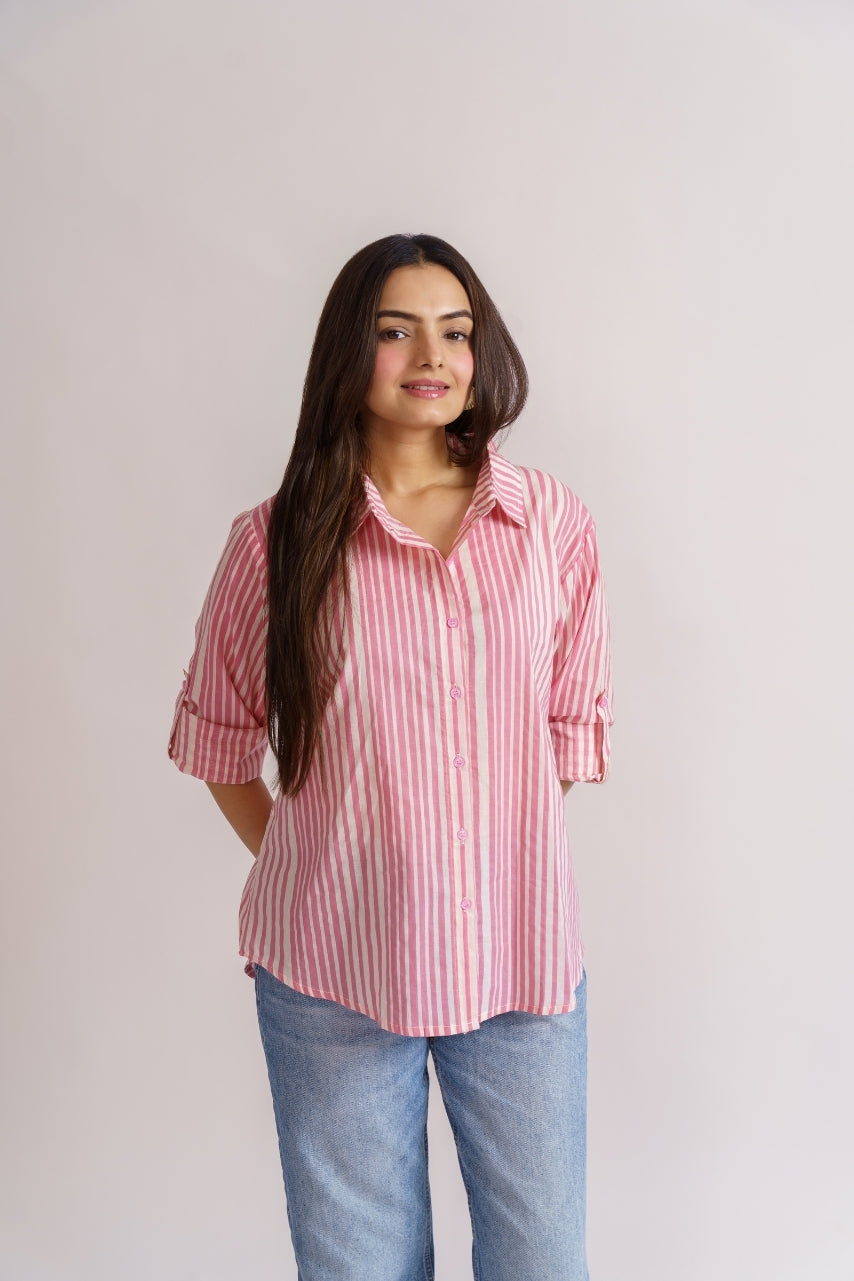 Pink stripe shirt styled with blue denim jeans, casual outfit
