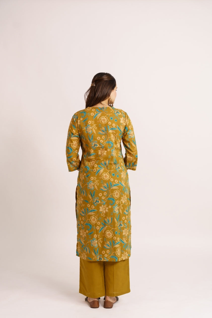 Olive mustard printed kurta styled with hoop earrings