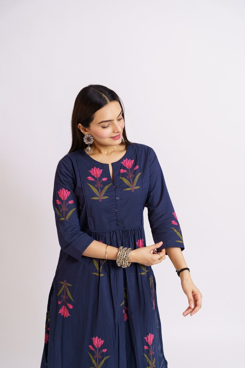 Navy printed kurta set styled with silver jhumka earrings