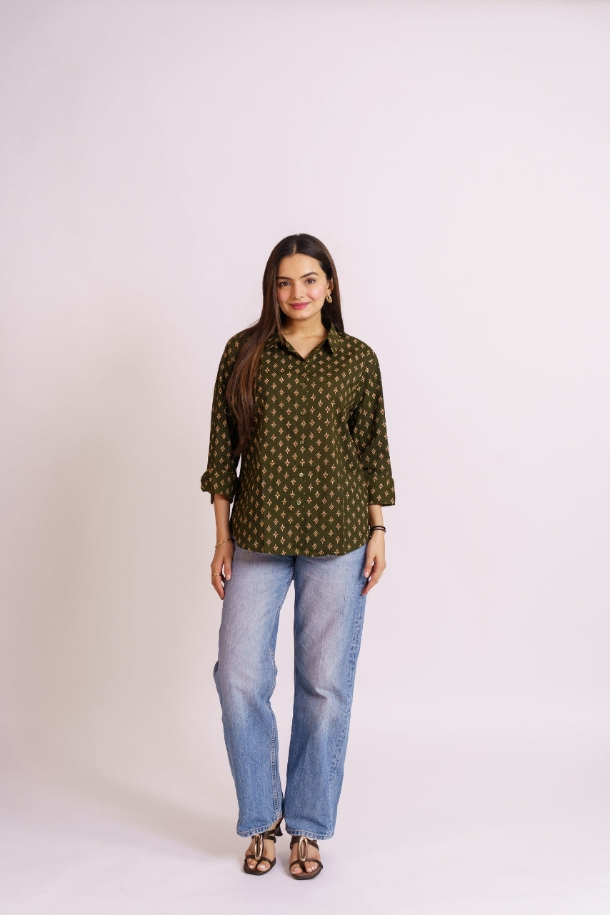Olive green cotton printed shirt for women styled with blue jeans