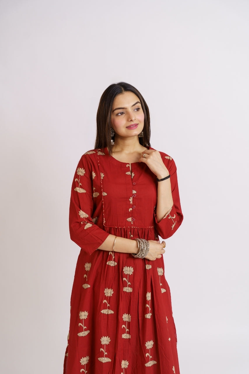 Maroon printed kurta set styled with jhumka earrings