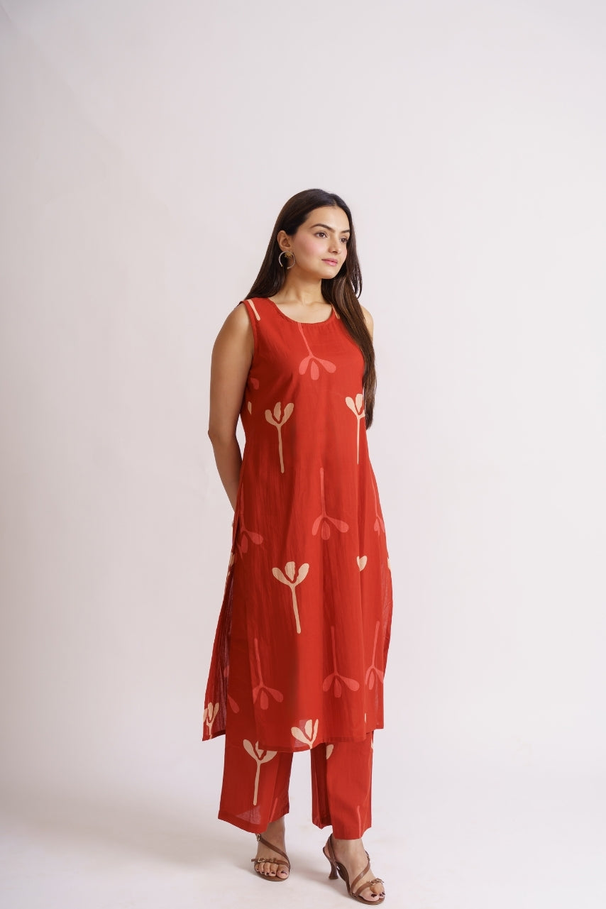 Rust tonal print sleeveless kurta and pants set for women