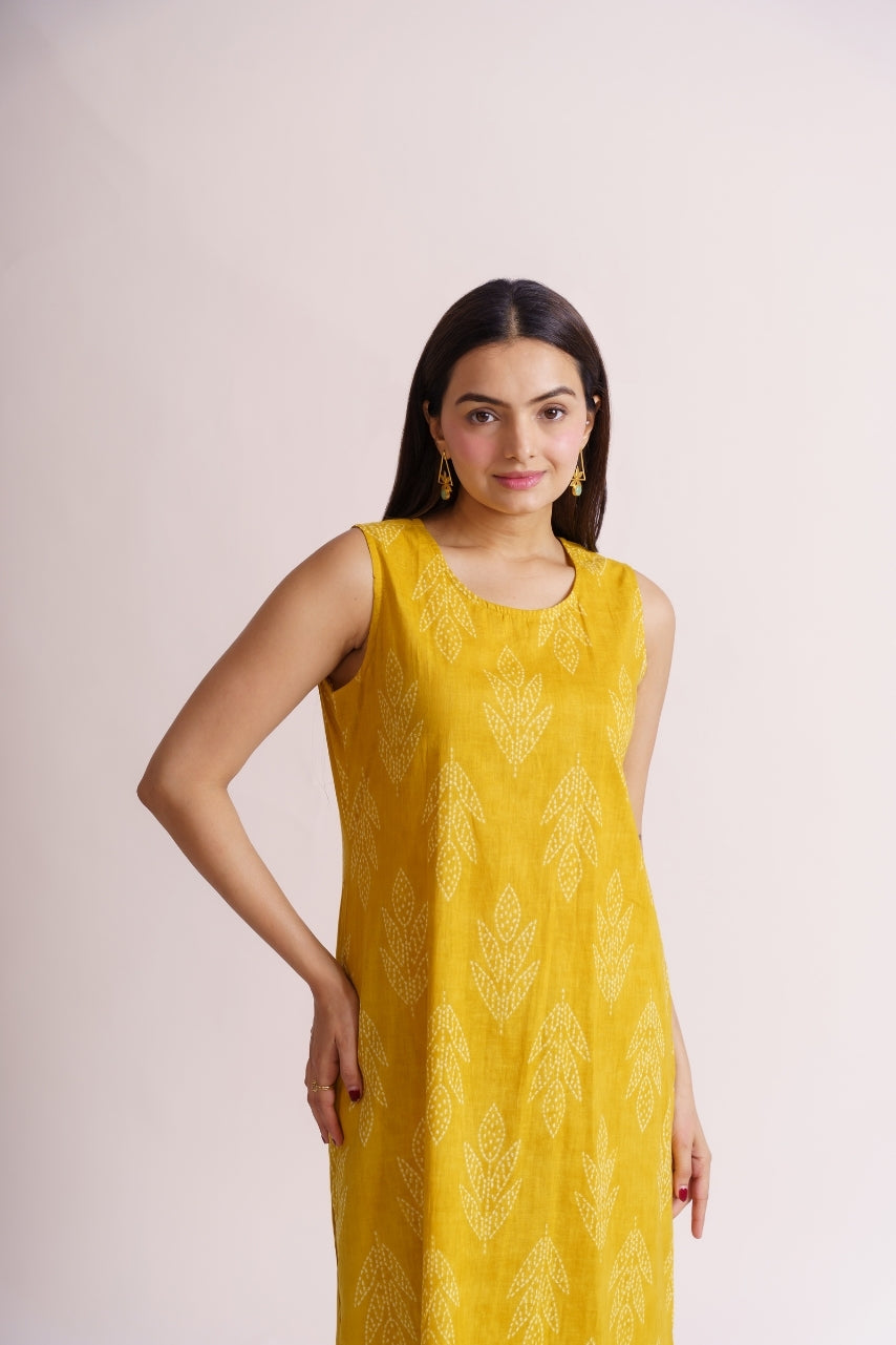 Yellow tonal leaf print sleeveless kurta with palazzo pants