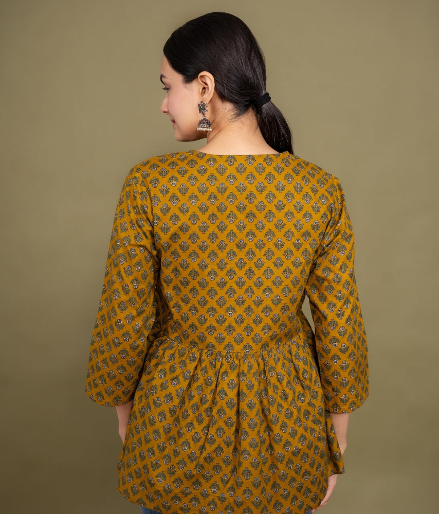 Women mustard floral angrakha printed cotton tunic top short kurti, back view