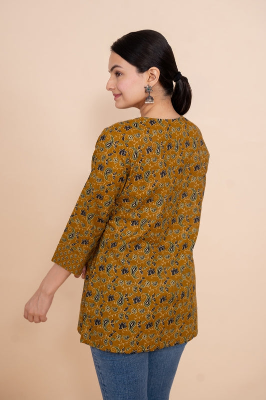 Women mustard floral designer printed cotton tunic top short kurti, back view