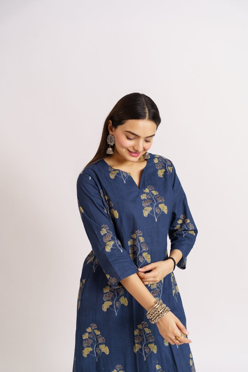 Navy printed kurta set styled with tassel jhumka earrings